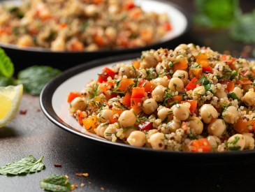 Chickpea Salad with Quinoa, sweet red pepper, herbs and lemon. Healthy food.