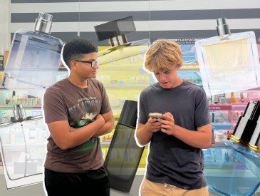 Two teen boys shopping at Sephora.