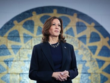 Democratic presidential candidate U.S. Vice President Kamala Harris waits to speak at a campaign rally at United Auto Workers Local 900 on August 8, 2024 in Wayne, Michigan. Kamala Harris and her newly selected running mate Tim Walz are campaigning across the country this week.