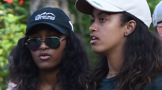 Sasha (L) and Malia (R), daughters of former US president Barack Obama, visit Tirtha Empul temple at Tampaksiring Village in Gianyar on the Indonesian resort island of Bali on June 27, 2017. Barack Obama kicked off a 10-day family holiday in Indonesia that will take in Bali and Jakarta, the city where he spent part of his childhood, officials said on June 24.