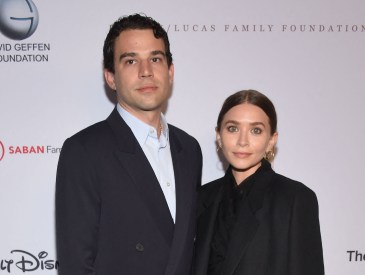 US actress Ashley Olsen (R) and boyfriend Louis Eisner arrive for the Young Eisner Scholars (YES) 20th Anniversary Celebration at The Maybourne Beverly Hills in Beverly Hills, California, on September 23, 2021. - YES is a non-profit which works to provide resources to underserved students to facilitate their success in high school and college.