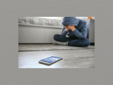 teen boy with cell phone